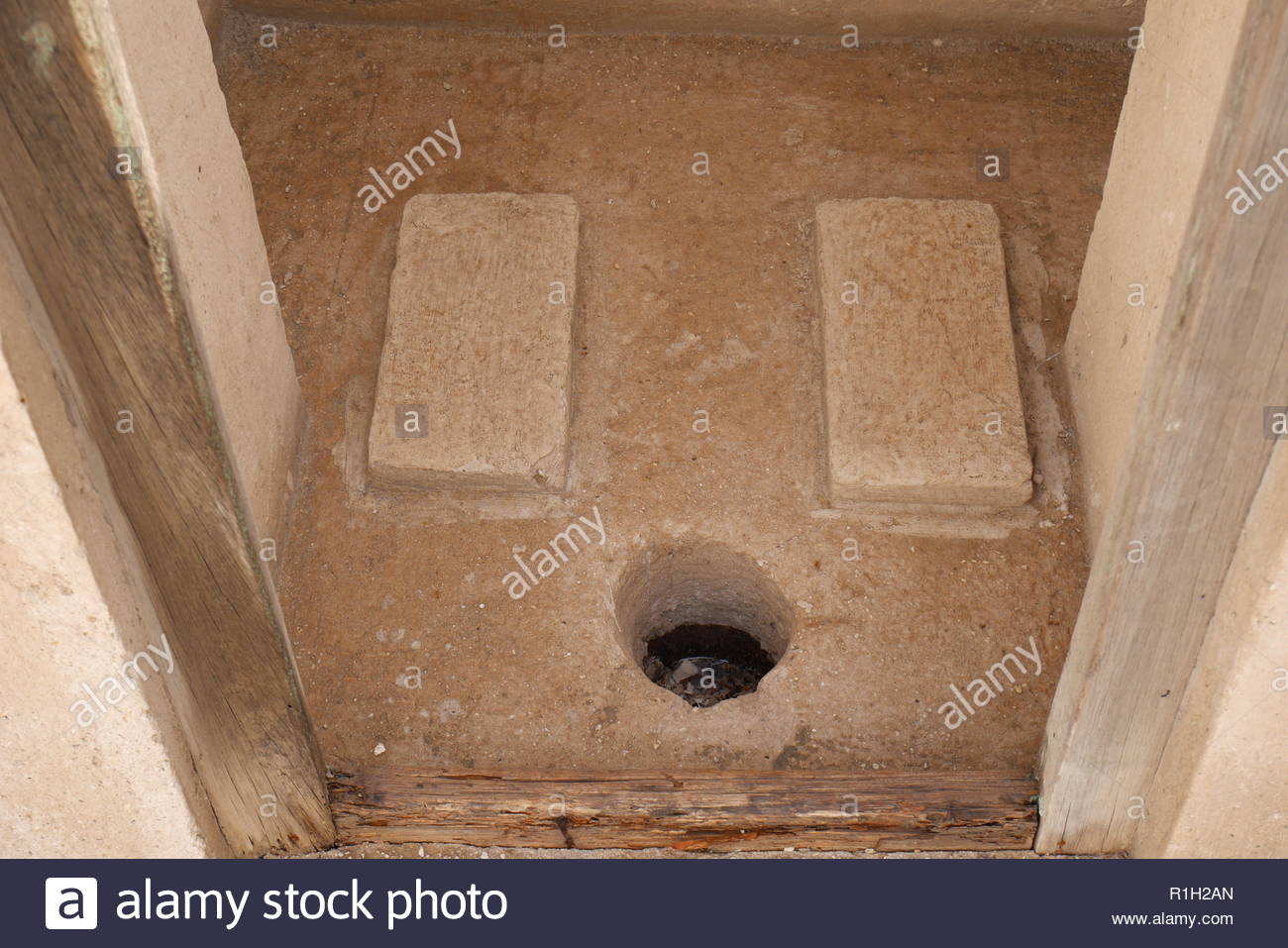 hole-in-the-floor-squat-toilet-al-alawi-house-located-on-the-pearl-trail-muharraq-kingdom-of-b...jpg