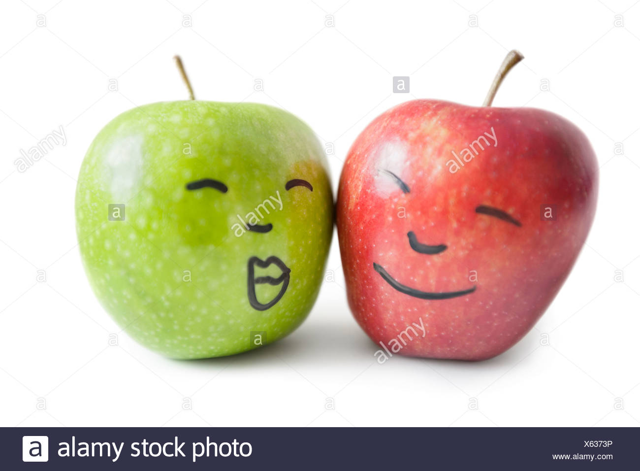 red-and-green-apples-with-face-over-white-background-X6373P.jpg