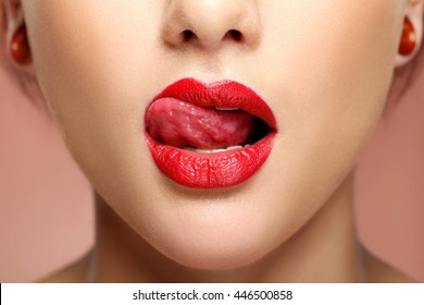 closeup-view-woman-licking-red-260nw-446500858.jpg