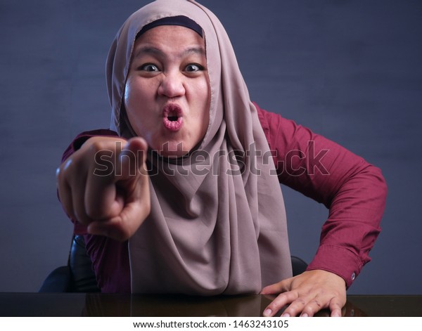 portrait-angry-muslim-woman-wearing-600w-1463243105.jpg